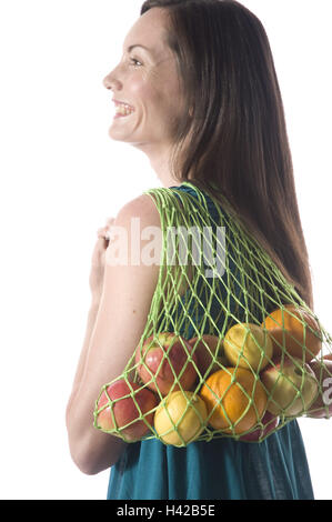 Donna, stringa di borsa, frutta, sorriso, ritratto, Foto Stock