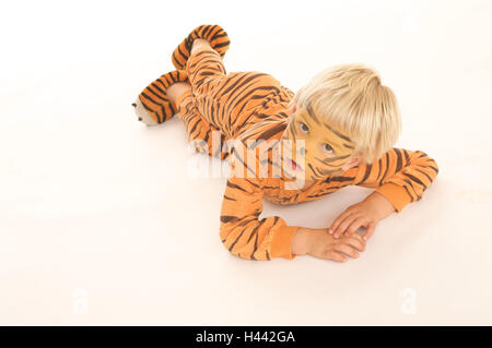 Il ragazzo, costume, travestimento, tiger, fatta, sdraiato, Foto Stock