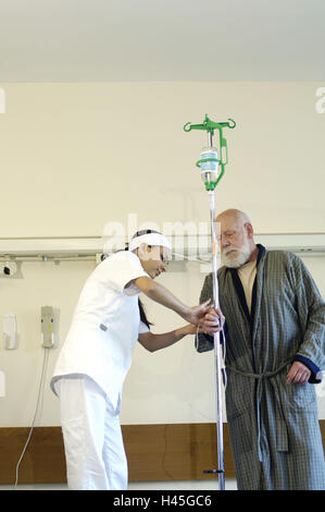 Ospedale, paziente, asta portaflebo, infermiere, Foto Stock