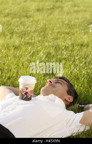 L'uomo, prato, giacciono, take it easy, Foto Stock