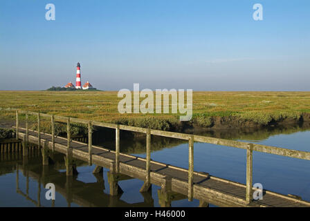 Germania, SCHLESWIG-HOLSTEIN, Eiderstedt, Westerhever, tideway, bridge, faro Westerheversand, Foto Stock