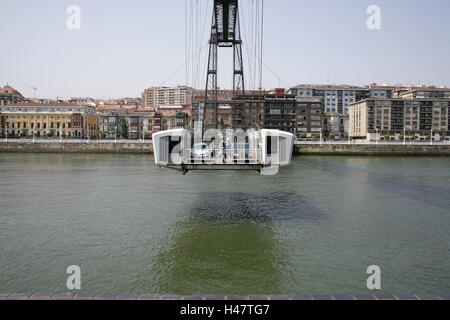 Spagna, provincia di Vizcaya, Bilbao, sul fiume Nervion, granella Puente Colgante de Bizkaia, Schwebefähre, parte città di Portugalete, le Province Basche, città, Porto, città industriale, canale, vista città, il lungomare, il mezzo di trasporto, trasportatore aereo, traghetto, Hängefähre, trans-port barca a remi, struttura, storicamente, automobili, veicoli, Überquerung, acque, tradurre, luogo di interesse, l'UNESCO-patrimonio culturale mondiale, Foto Stock