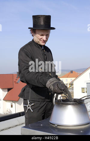 Spazzacamino, camino, lavoro, Foto Stock