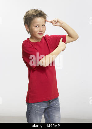 Ragazzo biondo, gesto, indice, fronte, braccio superiore modello rilasciato, persone, bambino, jeans, t-shirt, astuto, sapientemente, idea, la considerazione, stampa, intelligence, amido, studio, all'interno, Foto Stock