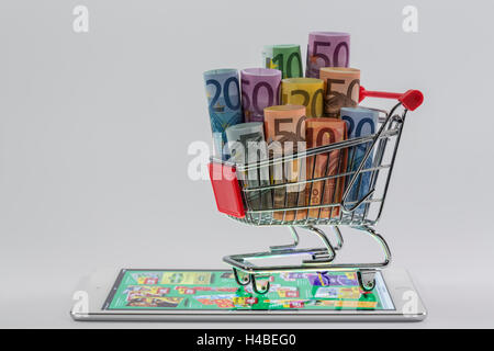 Carrello spesa, Apple iPad aria 2, Lidl online brochure, banconote, diverso, immagine simbolica, acquisti, shopping online, consumo, Foto Stock