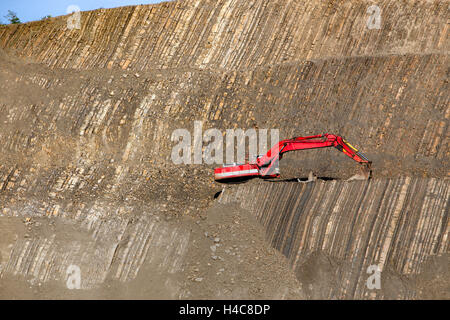 Red digger in pietra-pit Foto Stock