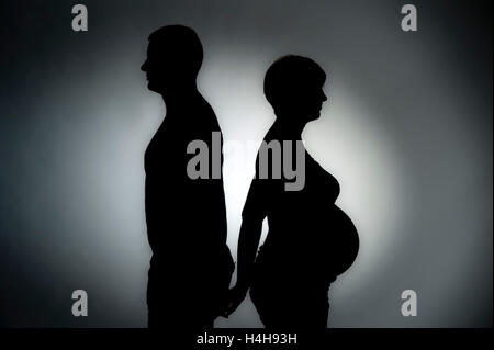 I genitori a essere come silhouette Foto Stock