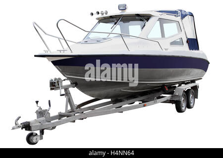 Cabina blu barca caricata sul rimorchio per il trasporto. Foto Stock
