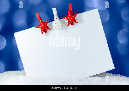 Natale biglietto di auguri con Red & White clothespins decorativi Foto Stock