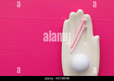 Dettaglio della mano artificiale con attrezzature da golf - Appartamento - Fotografia dei laici Foto Stock