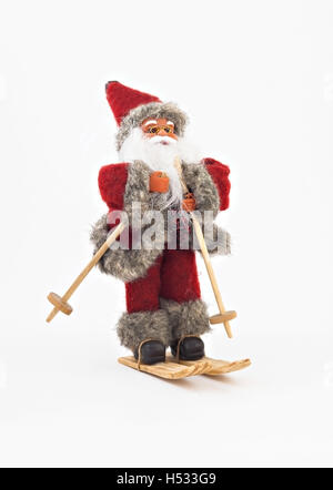 Babbo Natale sugli sci giocattolo ad albero isolato Foto Stock