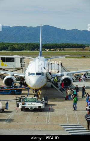 Deboarding passeggeri in aeroporto Foto Stock