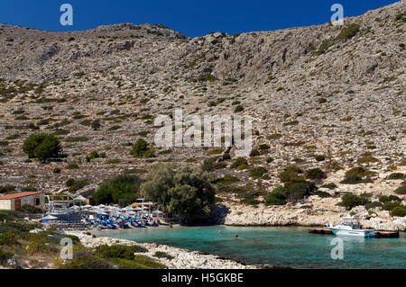 Spiaggia Kania, Chalki isola vicino a RODI, DODECANNESO isole, Grecia. Foto Stock