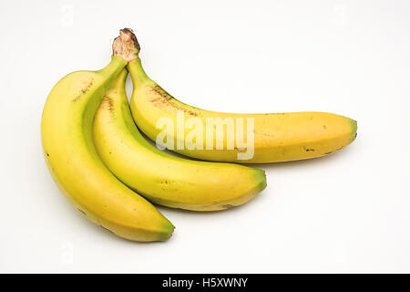 Le banane provenienti dalle Canarie su sfondo bianco Foto Stock