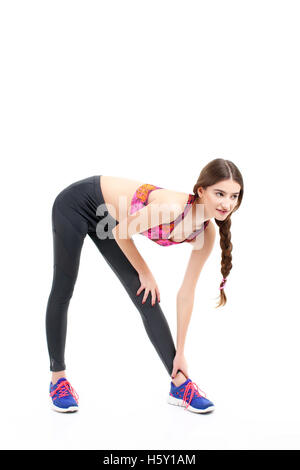 Bellissimo sport donna facendo stretching esercizio fitness Foto Stock