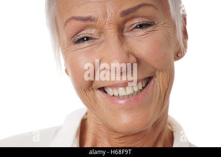 Close-up donna anziana con sorriso toothy Foto Stock