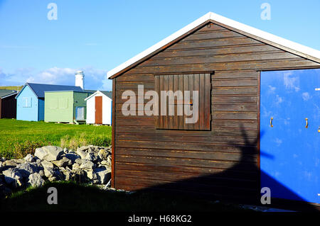 Vecchio faro e Fisherman capanne in Portland Foto Stock