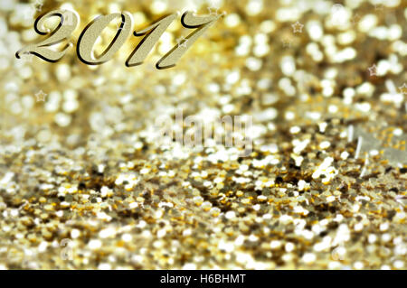 2017 scritto su golden e luminosa sullo sfondo di confetti Foto Stock