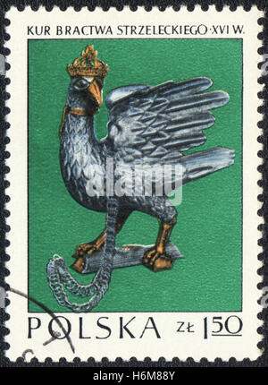 Un francobollo stampato in Polonia mostra Silver Chicken - l'emblema della Archer Cracovia fratellanza Kurkova, circa 1970 Foto Stock