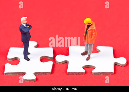 Datori di lavoro e lavoratori a puzzle Foto Stock