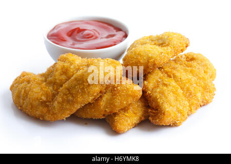 Golden Fried Chicken strisce su bianco. Con piatto di ketchup. Foto Stock