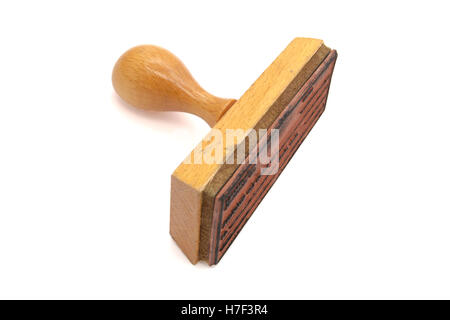 Vecchio francobollo di legno isolato su sfondo bianco Foto Stock