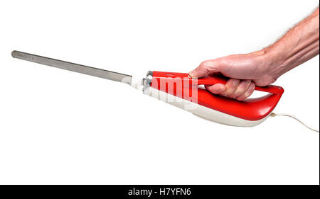 Maschio lato tenendo un Vintage electric coltello da cucina Foto Stock