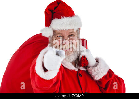 Ritratto di santa claus holding borsa natale e gesticolando Foto Stock