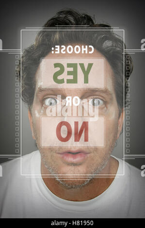 Parole cerca uomo nella parte anteriore dello schermo a sfioramento di decidere su sì di n. Foto Stock