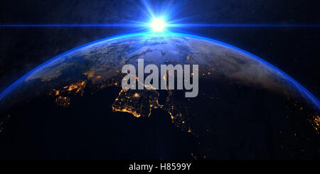 Blue Sunrise sulla terra come visto dallo spazio. Con stelle dello sfondo. Foto Stock