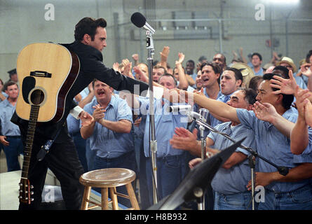 A piedi la linea, (A PIEDI LA LINEA) USA 2005, Regie: James Mangold, Joaquin Phoenix, Chiave: Musiker, Gitarre, Mikrofon. Publkum, ventole, Applaus Foto Stock