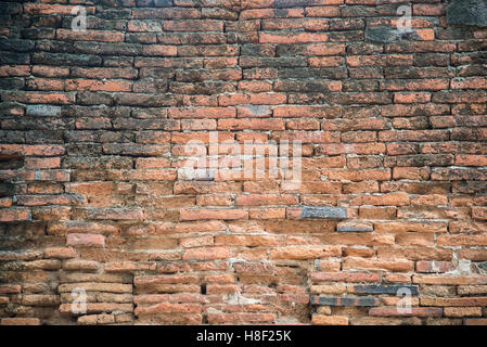 Antica rosso mattone grunge frammento di parete di sfondo, Foto Stock