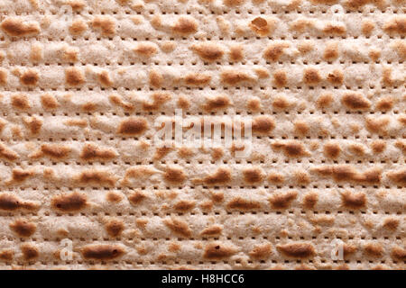 Tradizionale ebraica kosher matzah macro sfondo orizzontale Foto Stock