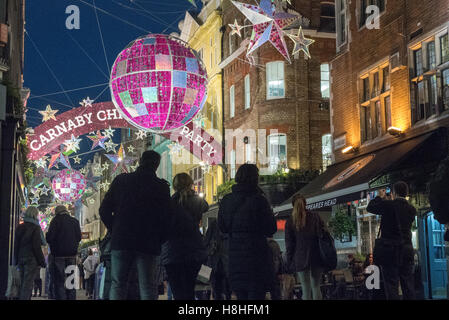 Le luci di Natale in Carnaby Street, Londra Foto Stock