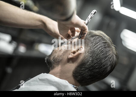 Fresare in barba barbiere Foto Stock