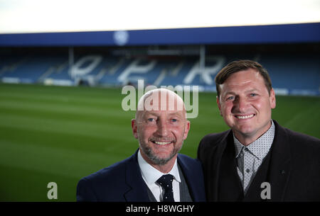 Nuovo Queens Park Rangers manager Ian Holloway (sinistra) e allenatore di Marc Bircham pongono dopo la conferenza stampa a Loftus Road, Londra. Foto Stock