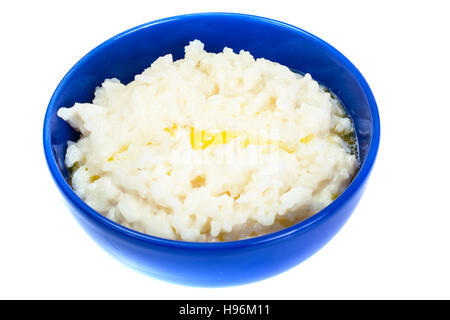 Budino di riso in una ciotola blu. Foto Studio Foto Stock