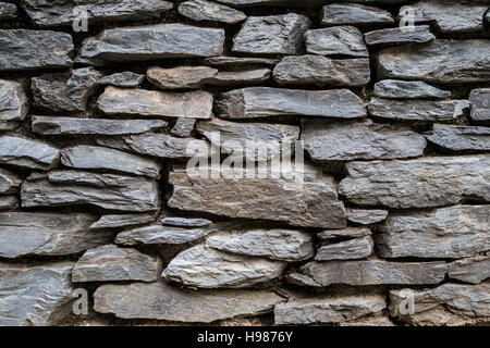 Impilati muro di pietra orizzontale dell'immagine di sfondo Foto Stock