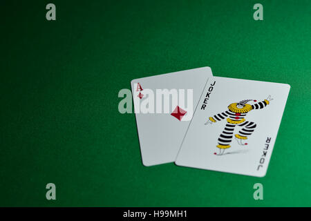 Due carte da gioco ace e un jolly Foto Stock