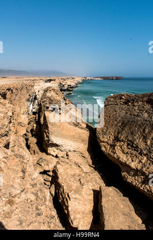 Vista coastside Taqah città plateau Salalah Dhofar Sultanato di Oman 5 Foto Stock