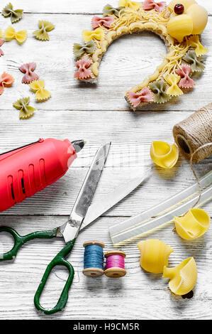 Produttore di giocattoli a forma di ferro di cavallo di pasta Foto Stock