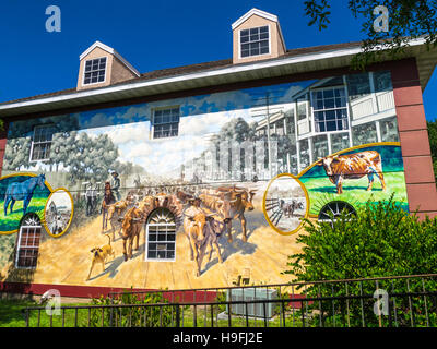 Murales dipinti sulle pareti esterne di edifici in Punta Gorda in Charlotte County Florida Foto Stock