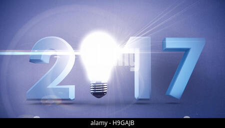Immagine composita del 2017 con incandescente lampadina luce su sfondo bianco Foto Stock