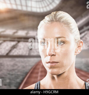 Immagine composita di close-up di serio atleta femminile Foto Stock