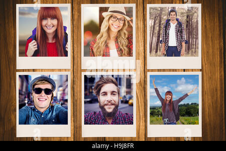 Immagine composita di sorridere hipster donna con una borsa da viaggio prendendo selfie Foto Stock