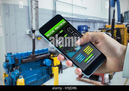 Immagine composita della mano che tiene lo smartphone Foto Stock