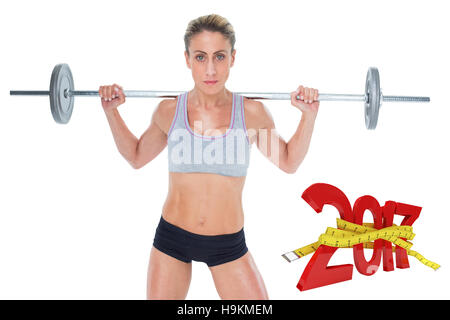 3D'immagine composita della femmina forte sollevamento crossfitter barbell dietro la testa Foto Stock