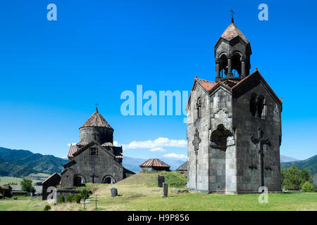 Undicesimo secolo Haghpat Monastero, Surb Nishan, la cattedrale e la torre campanaria, Haghbat, Lori Provincia, Armenia, Caucaso, Medio Oriente Foto Stock