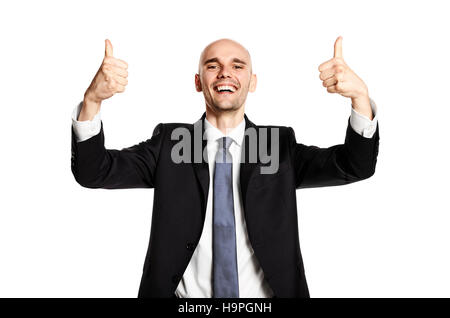 Ritratto di un giovane imprenditore che alza il pollice in un gesto di successo. Studio shot, isolato su sfondo bianco. Foto Stock