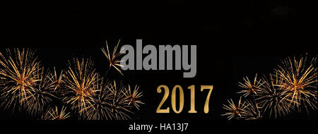 Fuochi d'artificio e golden figure 2017 su sfondo nero Foto Stock